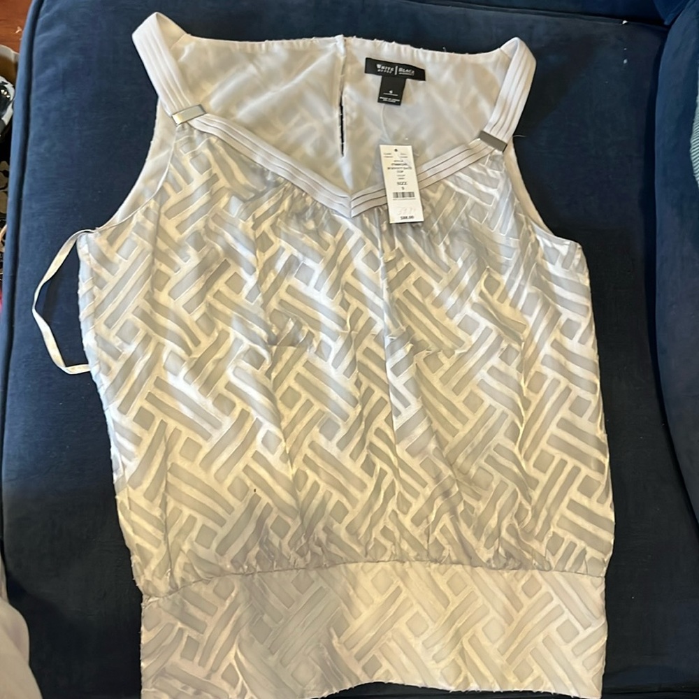 White House Black Market sleeveless top.